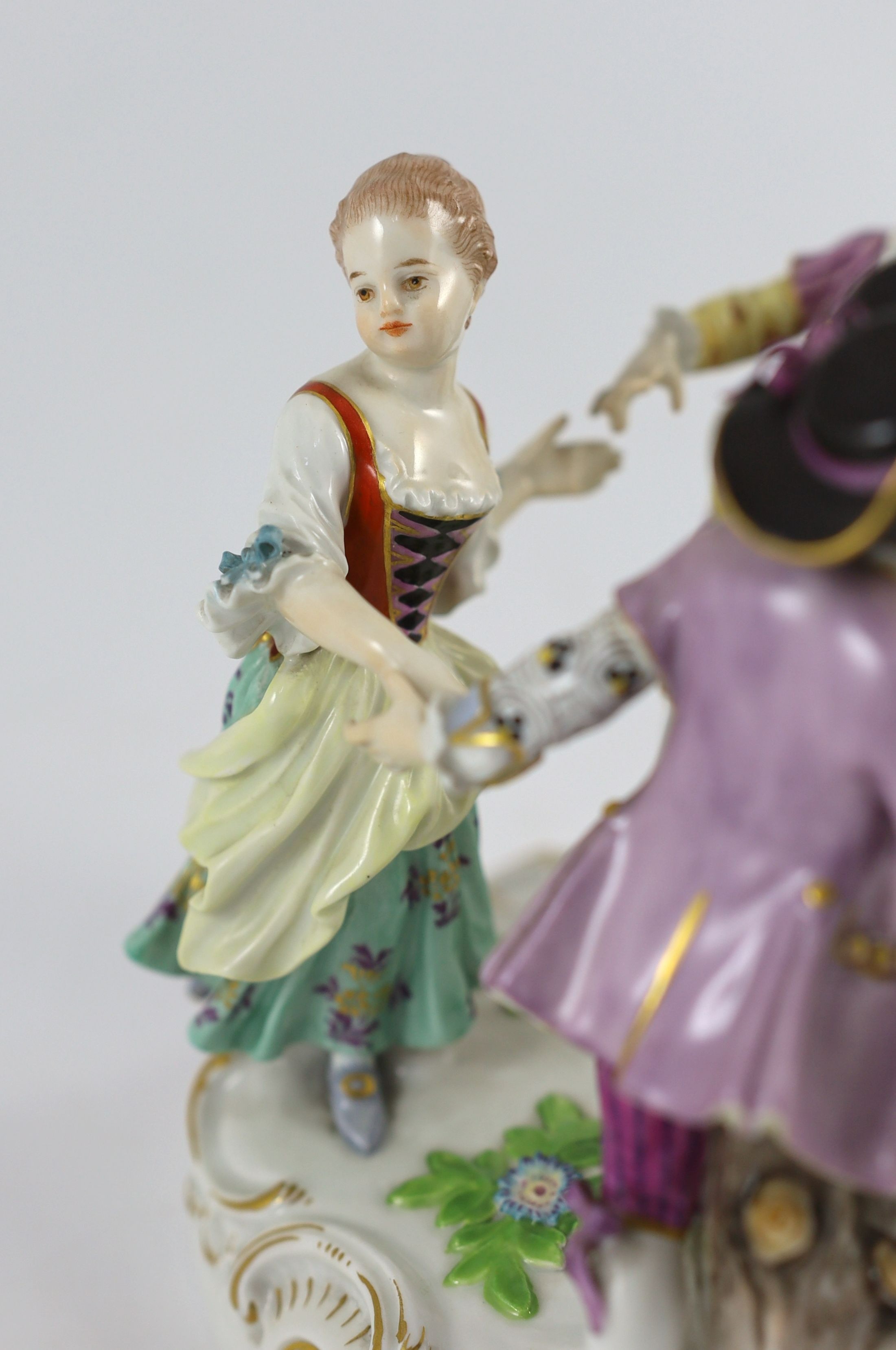 A Meissen group of four dancing children, early 20th century, 15 cm high